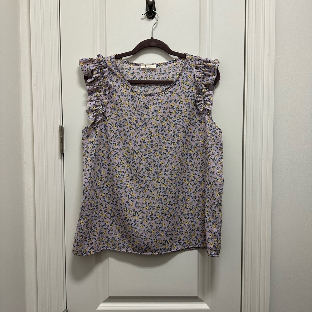 Ruffled sleeveless blouse